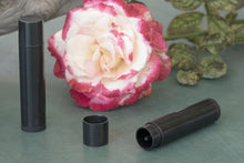 Load image into Gallery viewer, Black Twisting 0.15 oz Plastic-Free Lip Balm Tube