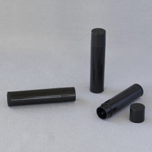 Load image into Gallery viewer, Black Twisting 0.15 oz Plastic-Free Lip Balm Tube